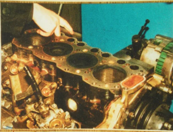 Test centre specialists inspect the engine teardown